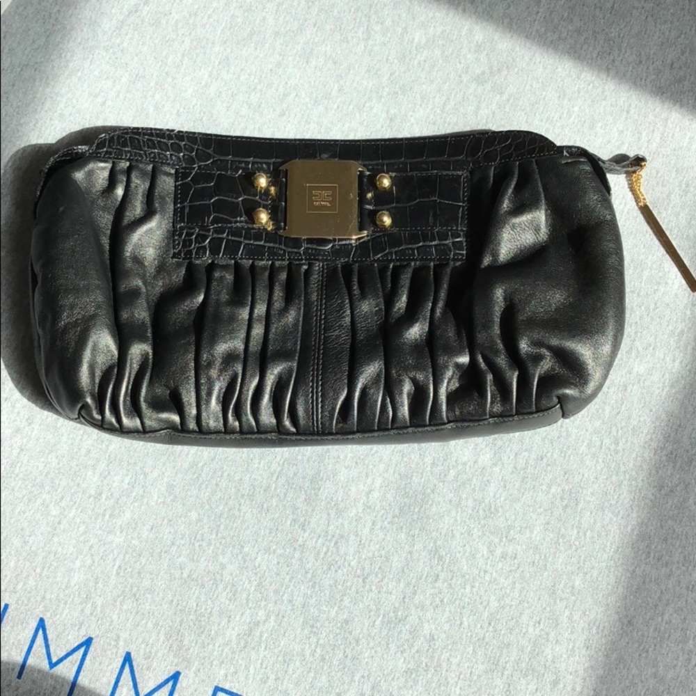 Black leather clutch with gold hardware